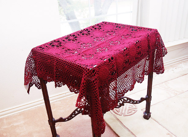 square festive colored crochet tablecloth
