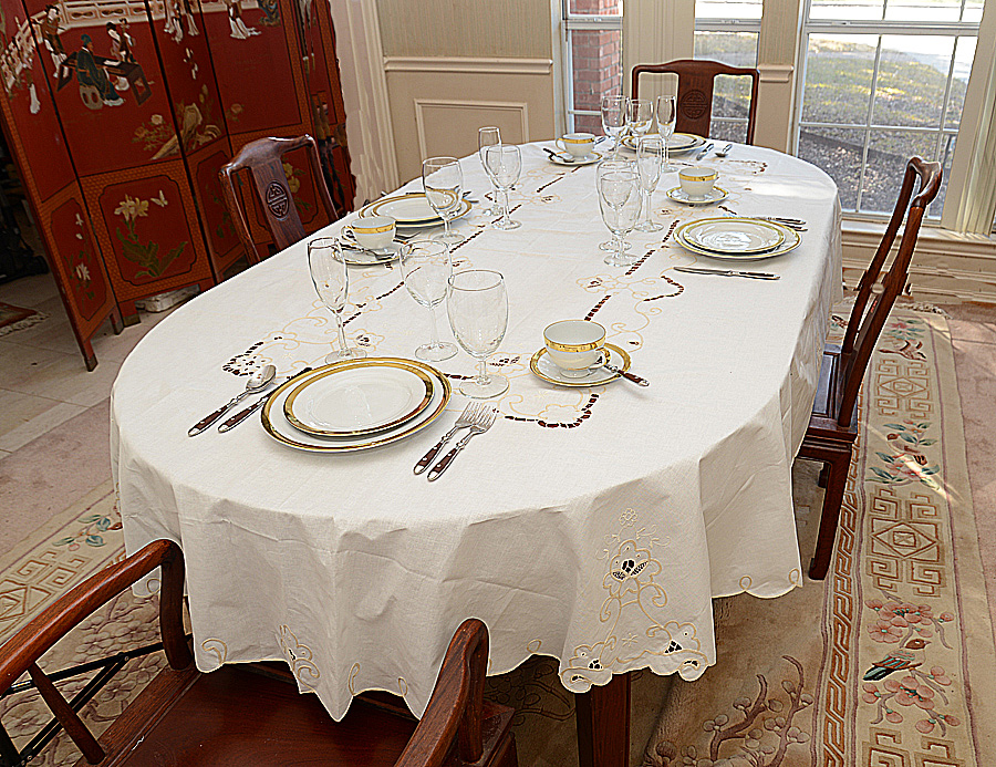 Oval Embroidered Tablecloth. Eggnog color
